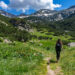 Jessica walking through a field in Pirin National Park