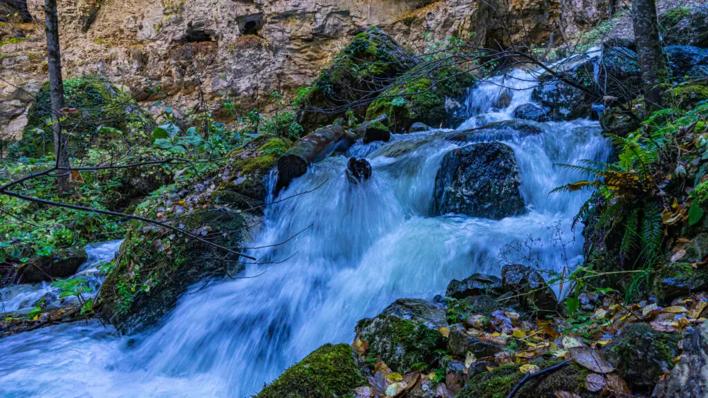 River and little waterfall at Devil's Throat Eco Trail in Bulgaria